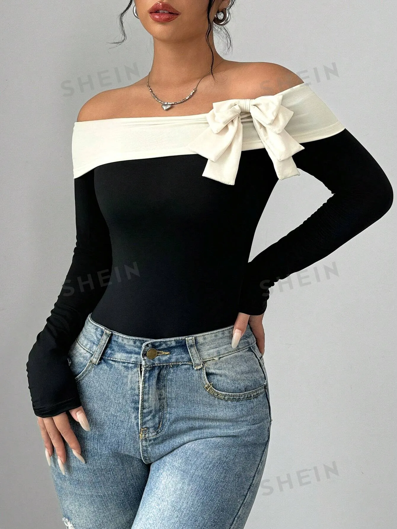 Elenzya Women's Contrast Color Bow Tie Decorated Off Shoulder Bodysuit