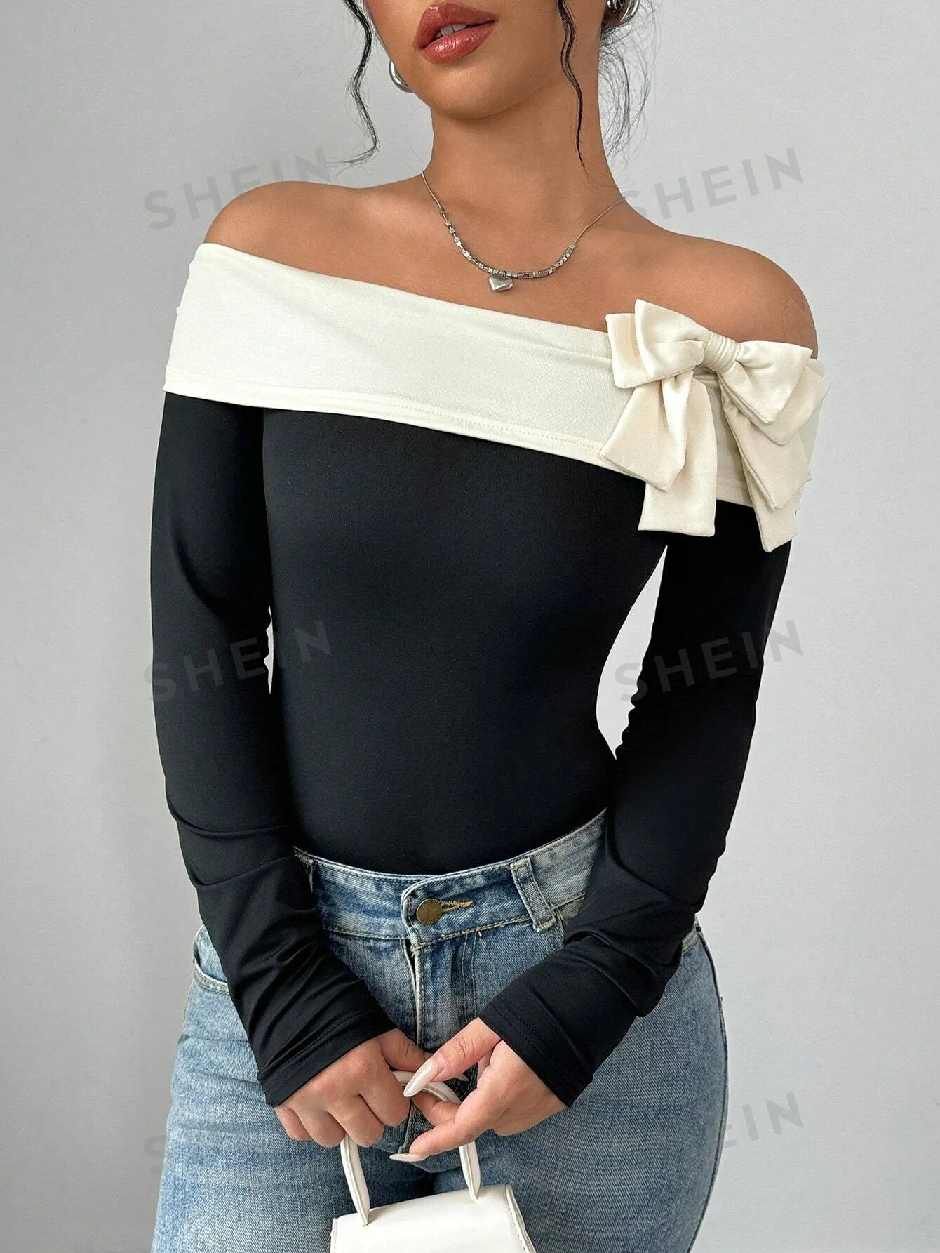 Elenzya Women's Contrast Color Bow Tie Decorated Off Shoulder Bodysuit